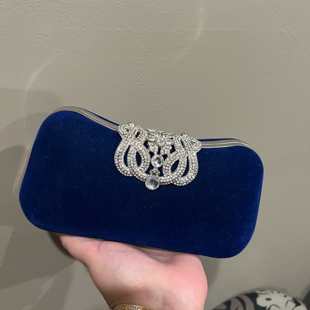 Blue velvet clutch with crystal latch